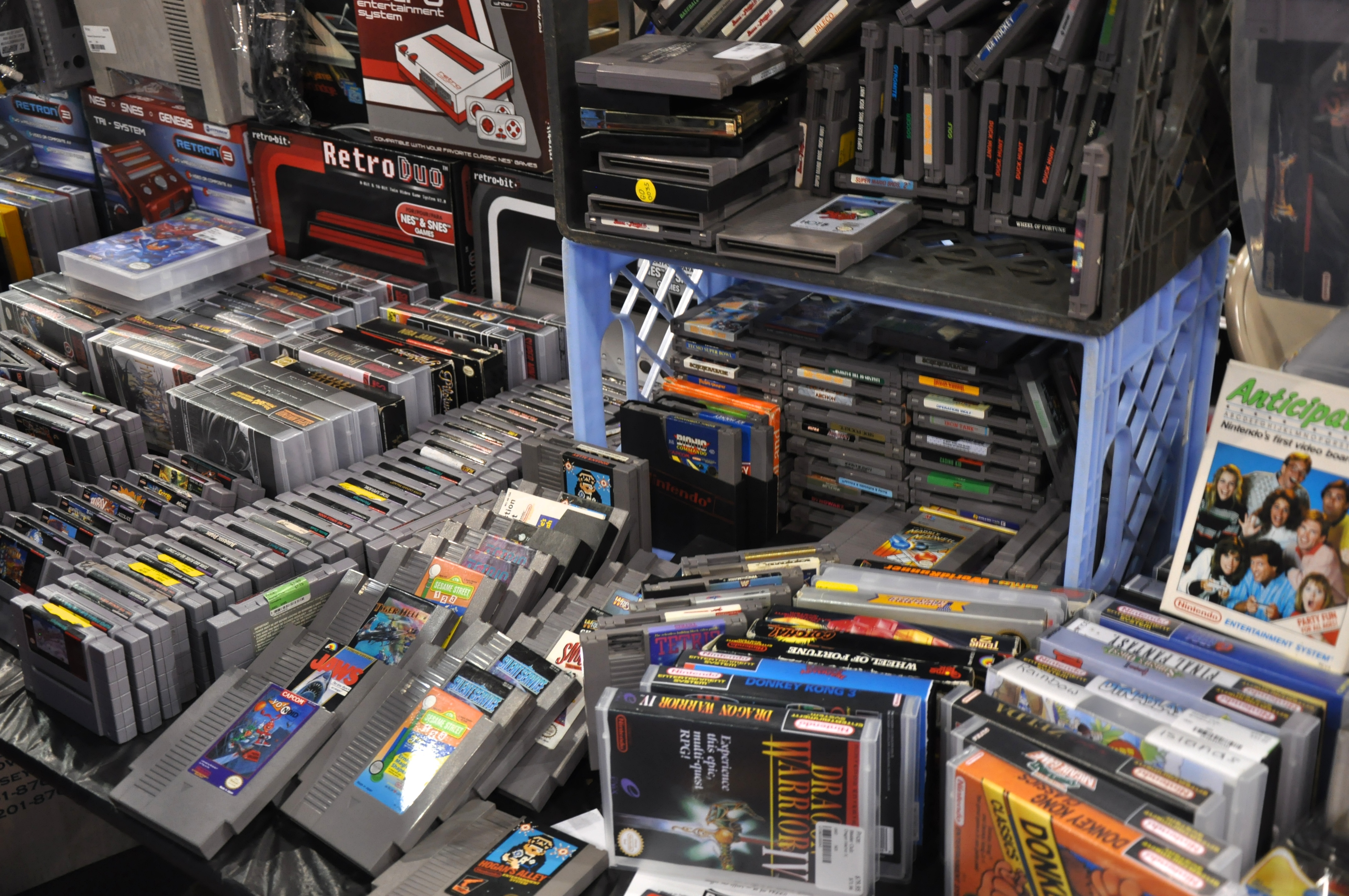 Stacks of retro games in a room